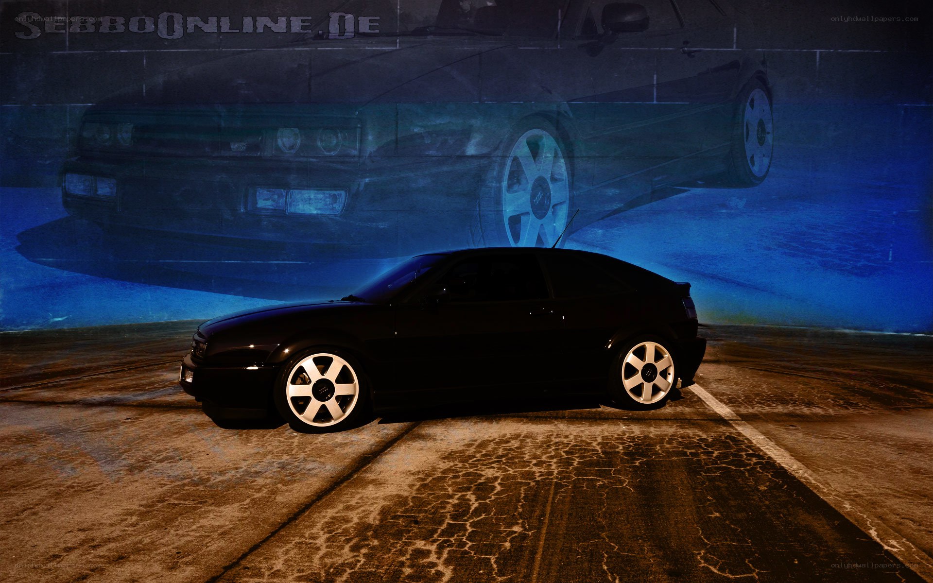 Black car in garage with projection