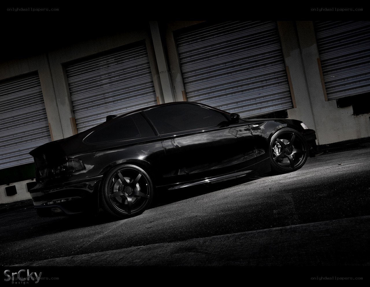 black car in garage