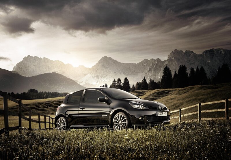 Black car in mountain landscape