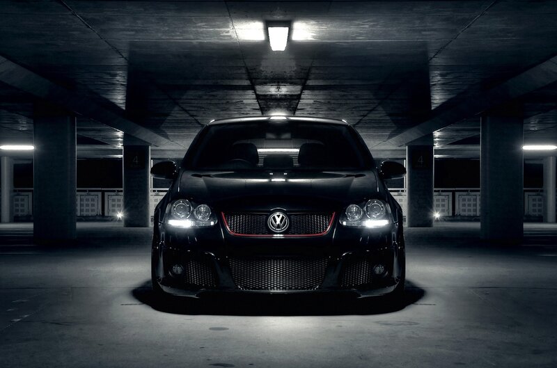 Black car in parking garage