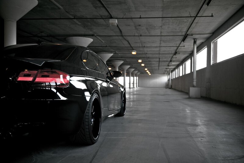 Black car in parking garage