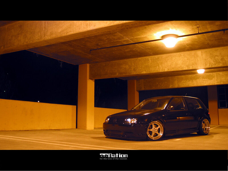 Black car in parking garage