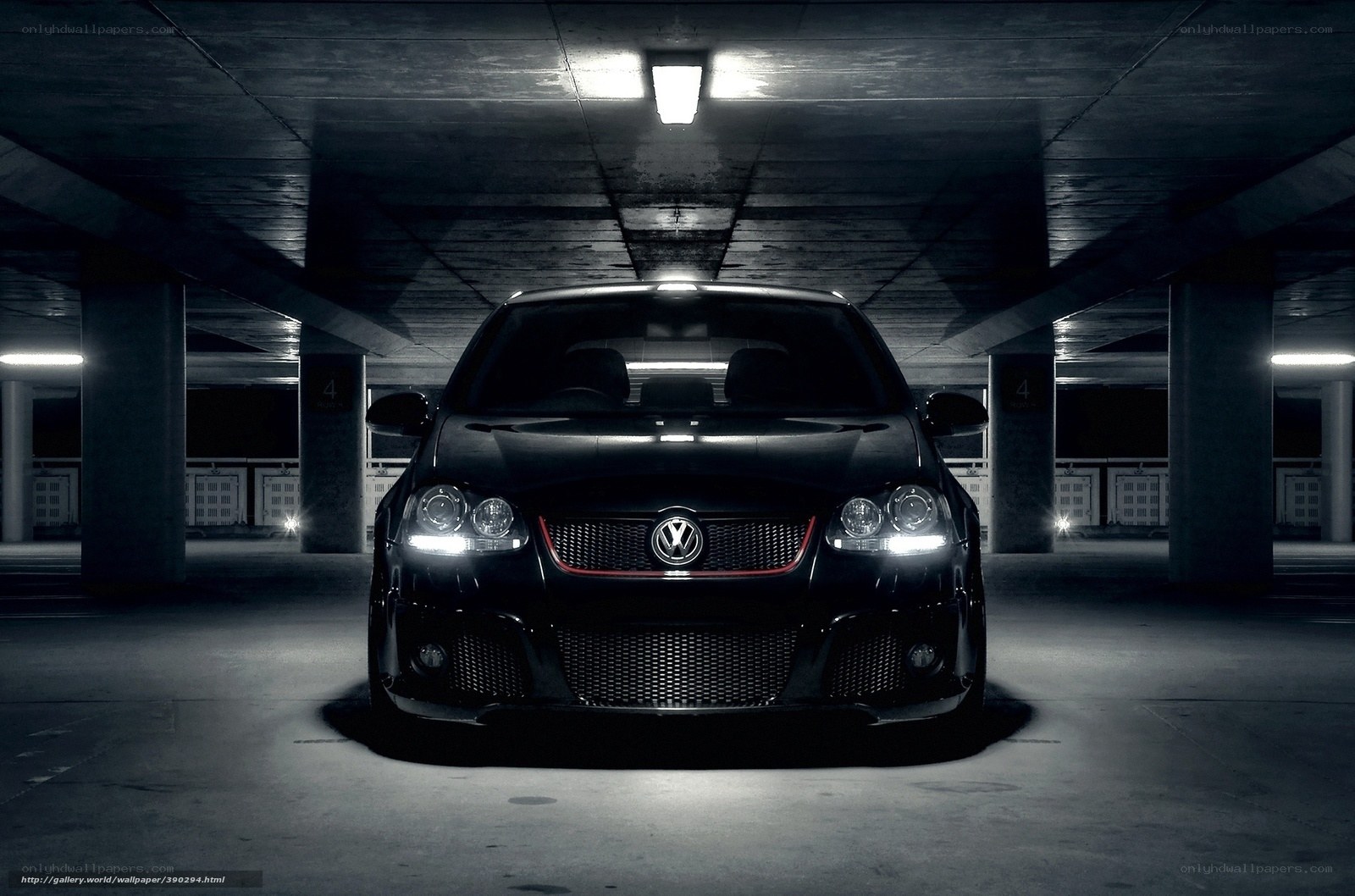 Black car in parking garage
