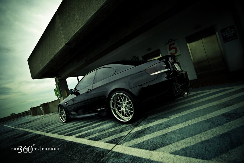 Black car in parking garage