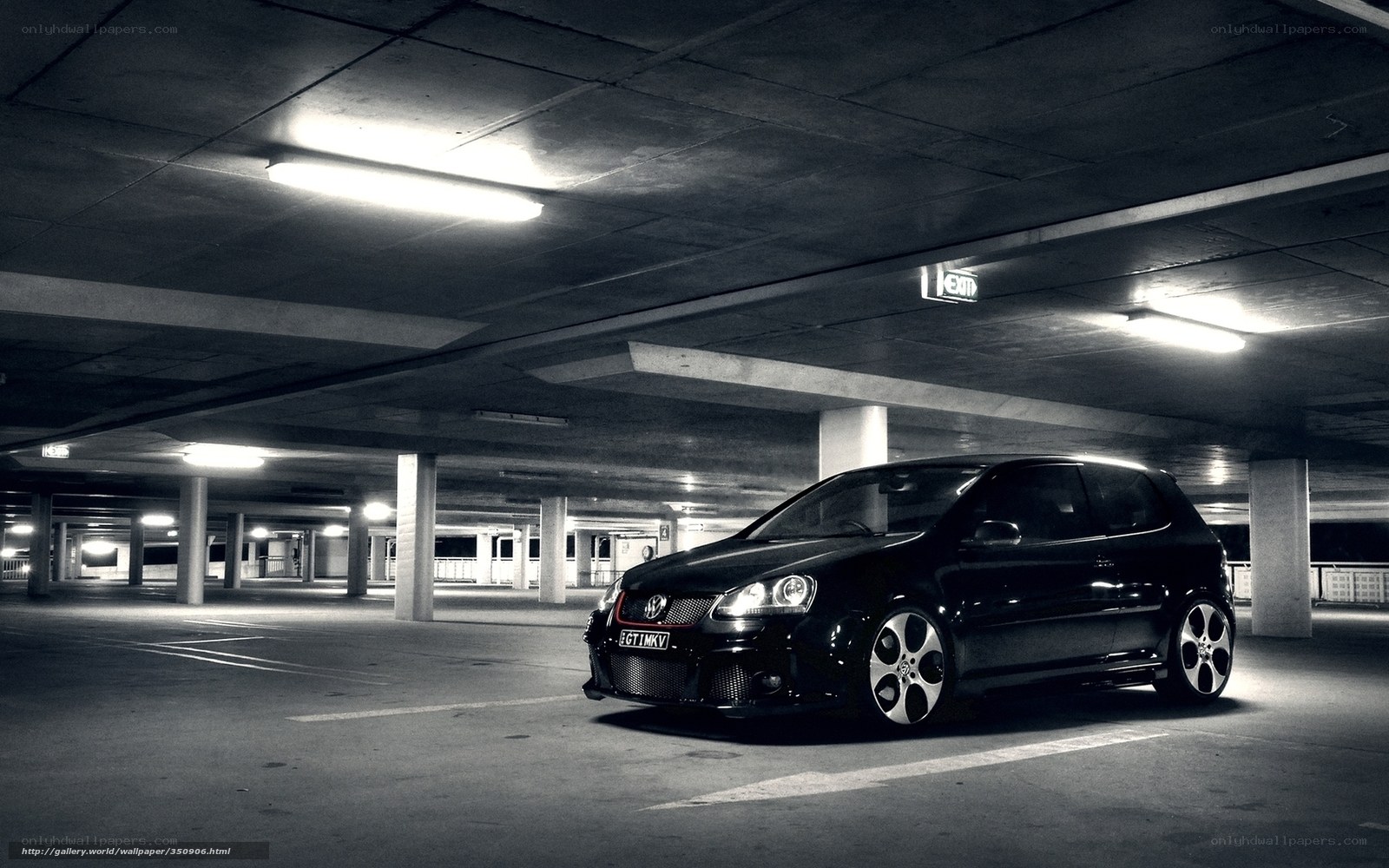 Black car in parking garage