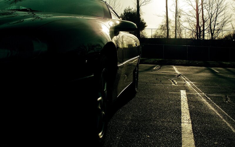 Black Car in Parking Lot — Dramatic, Sunset