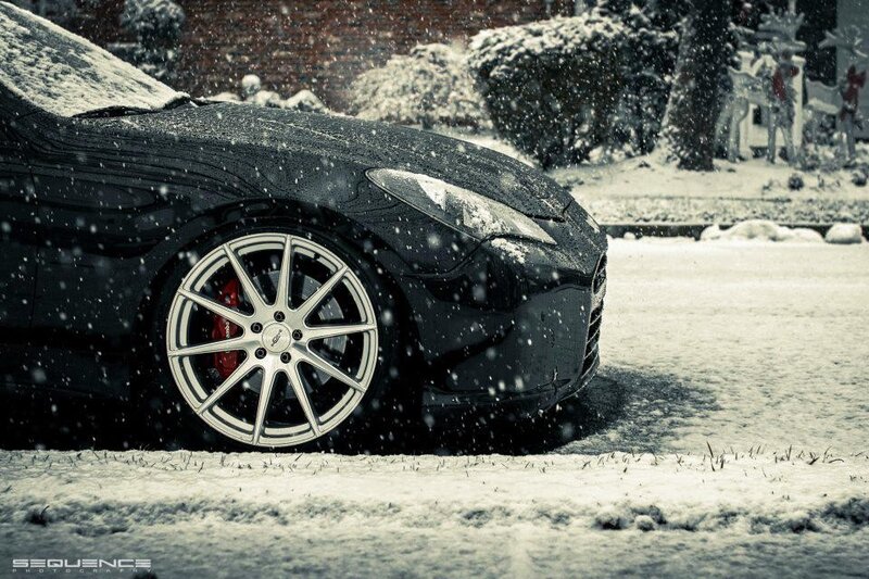 Black car in snowy scene