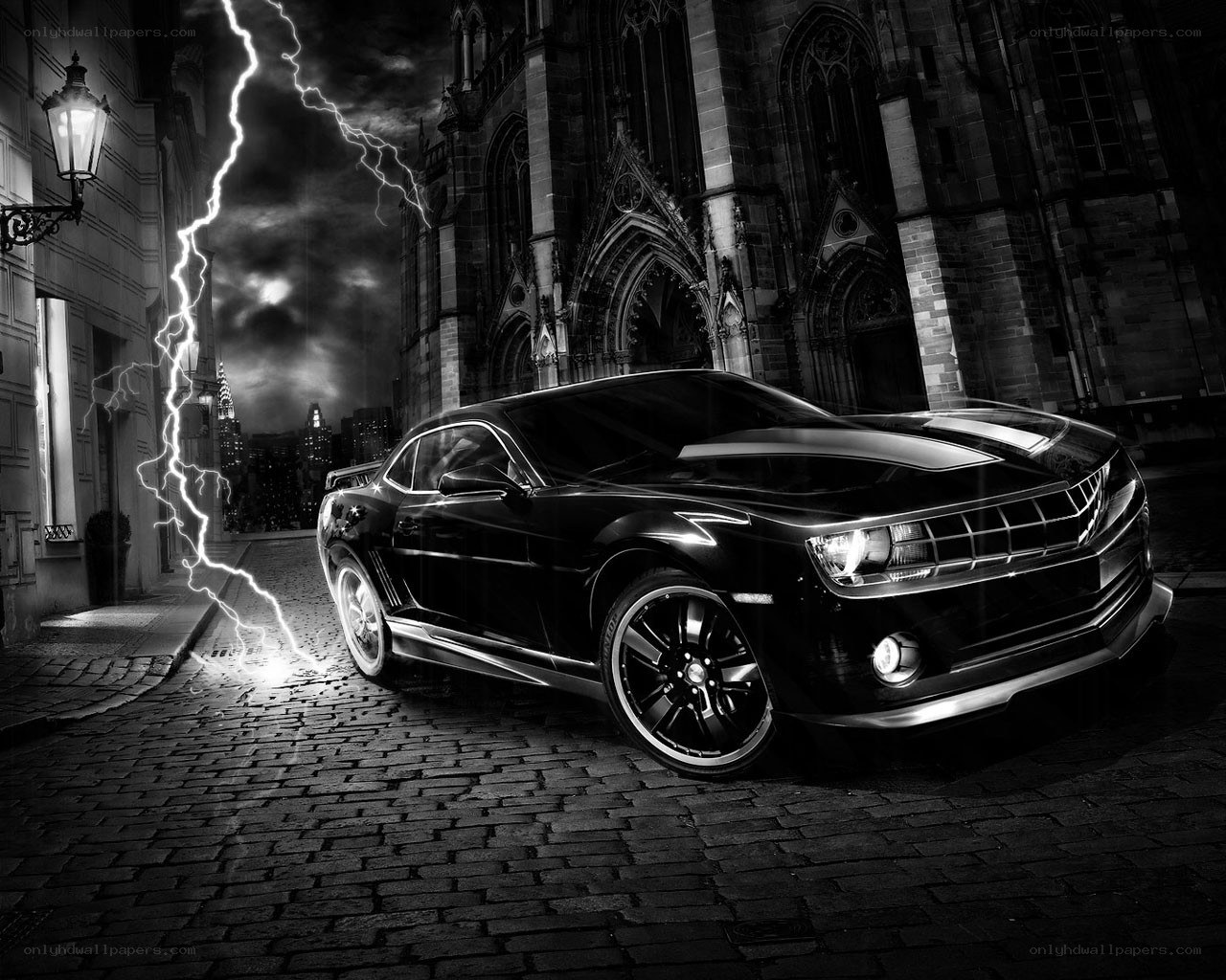 Black car in stormy city