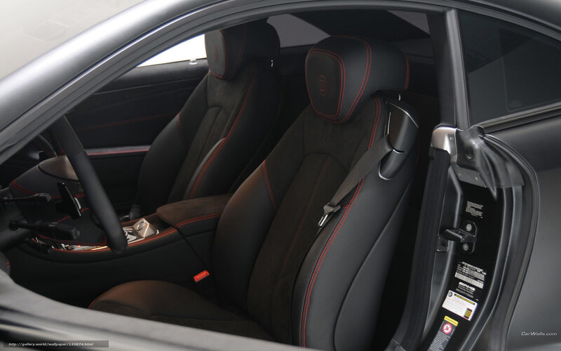 black car interior with red stitching