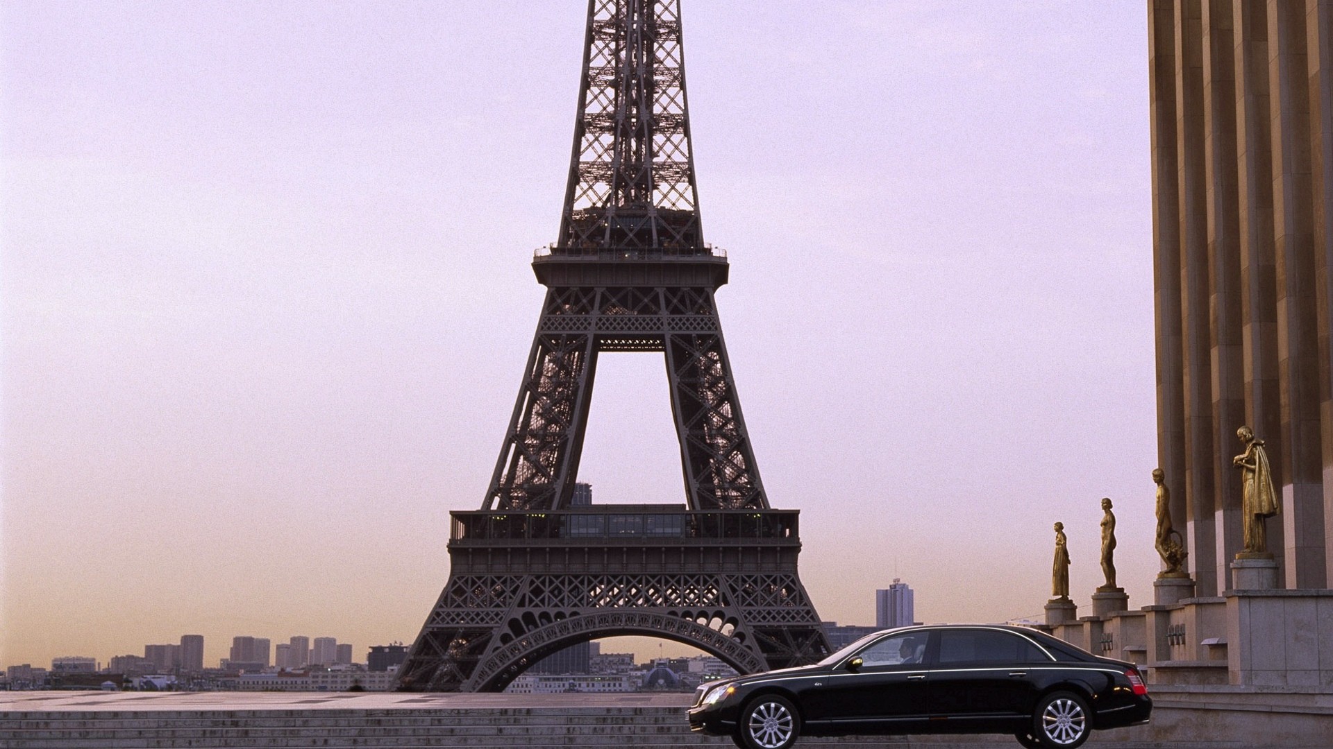 Black car near Eiffel Tower
