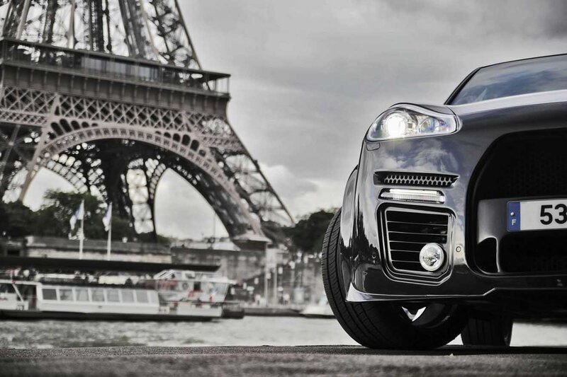 Black Car Near Eiffel Tower — Gray