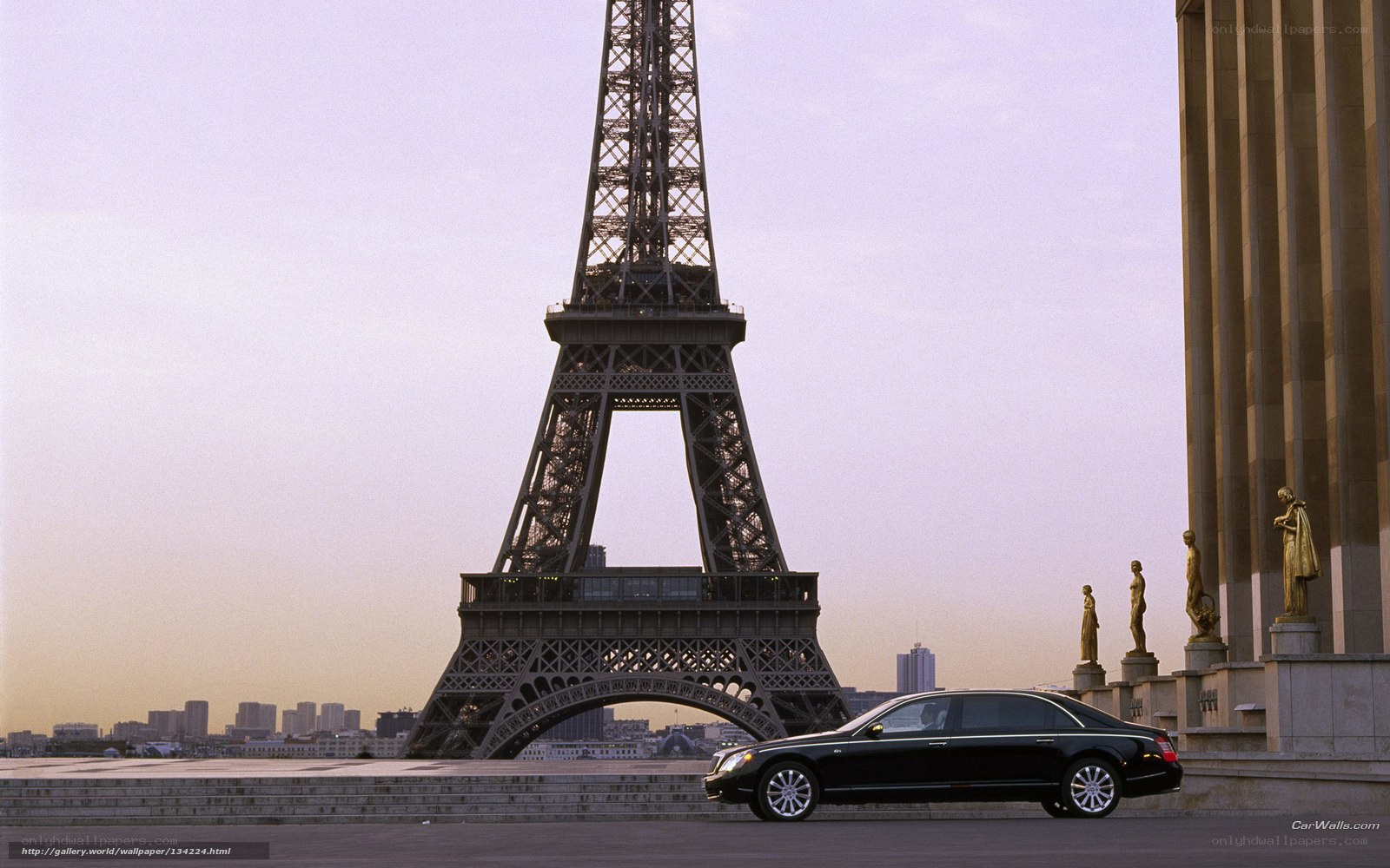 Black car near Eiffel Tower
