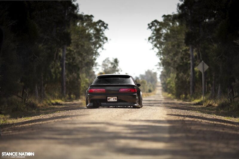 Black car on a country road