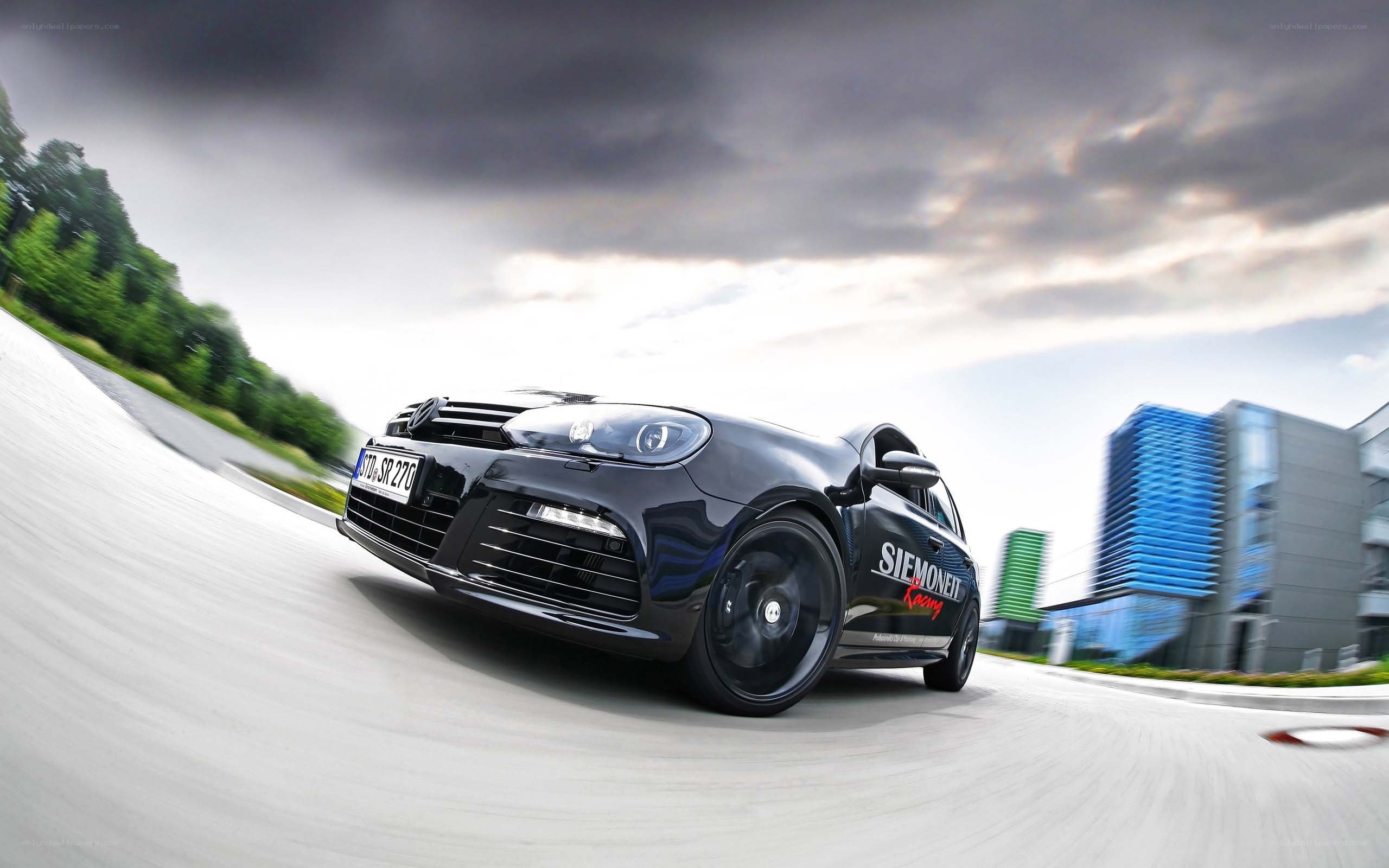 black car on a racetrack
