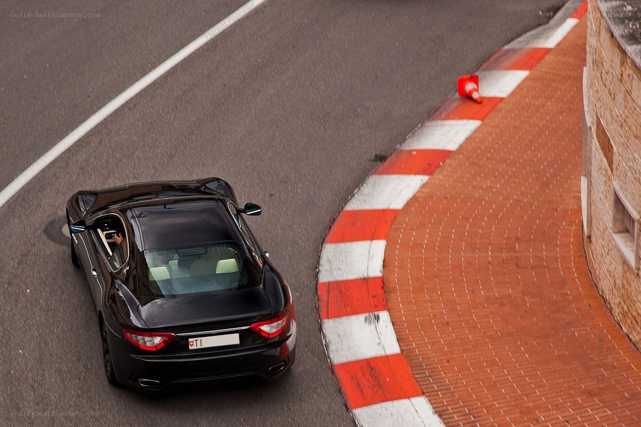 Black car on a racetrack