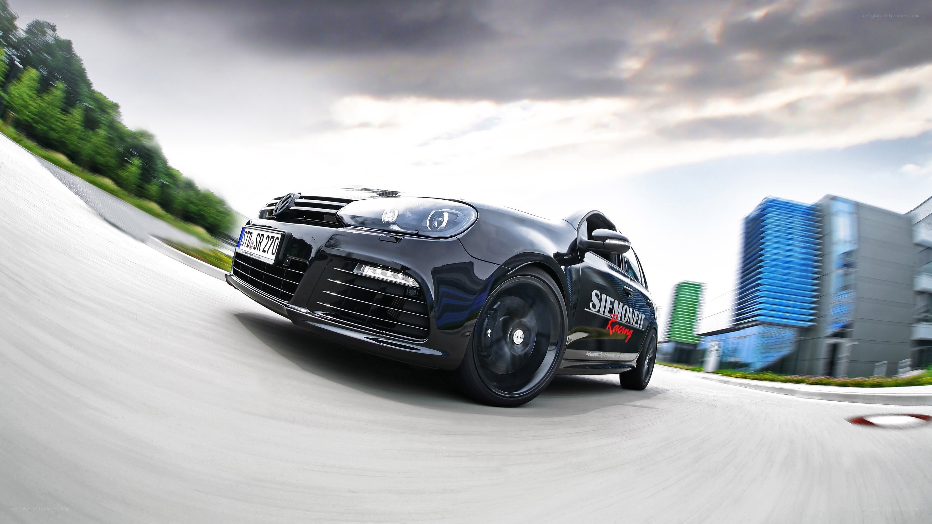 black car on a racetrack