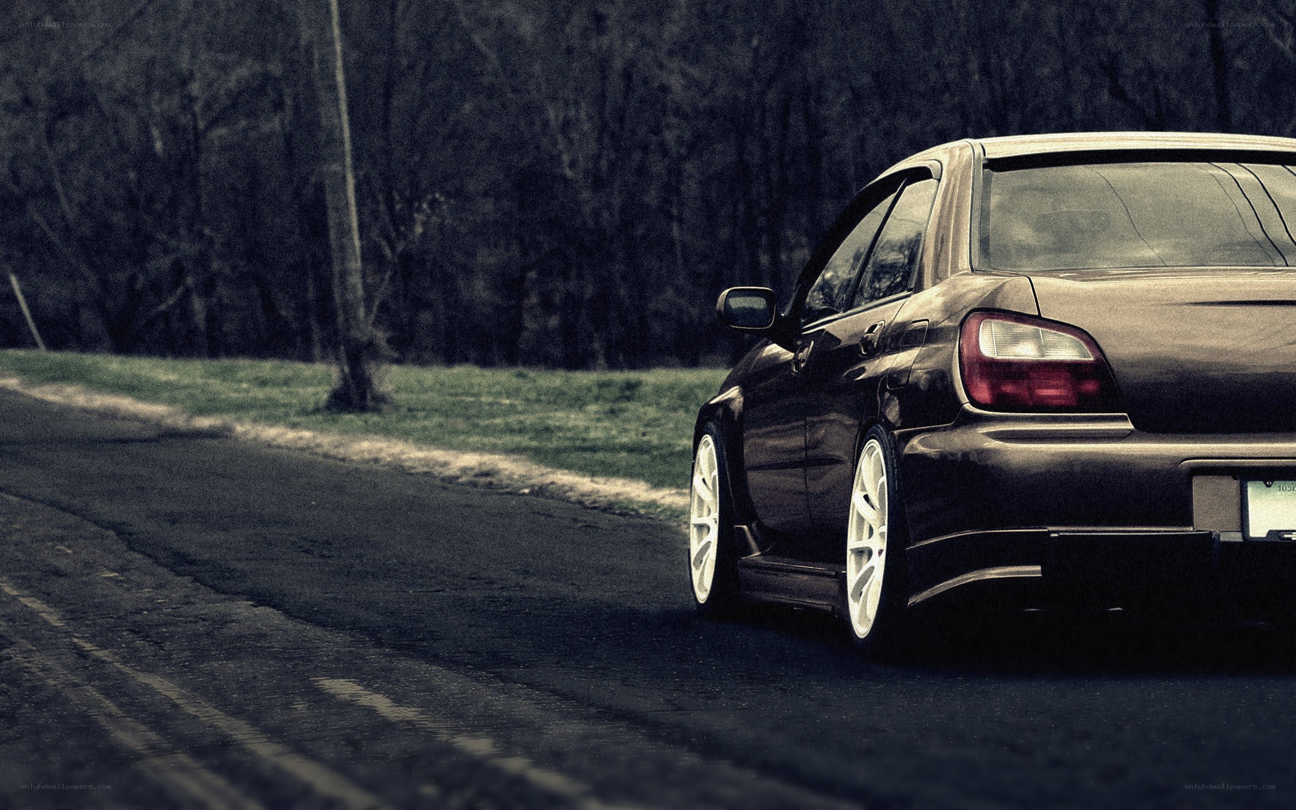 black car on a road