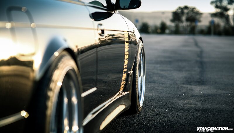 Black Car on Asphalt — Dramatic, Sunset