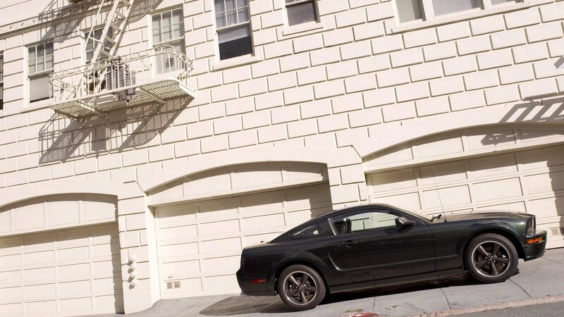 Black car on city street