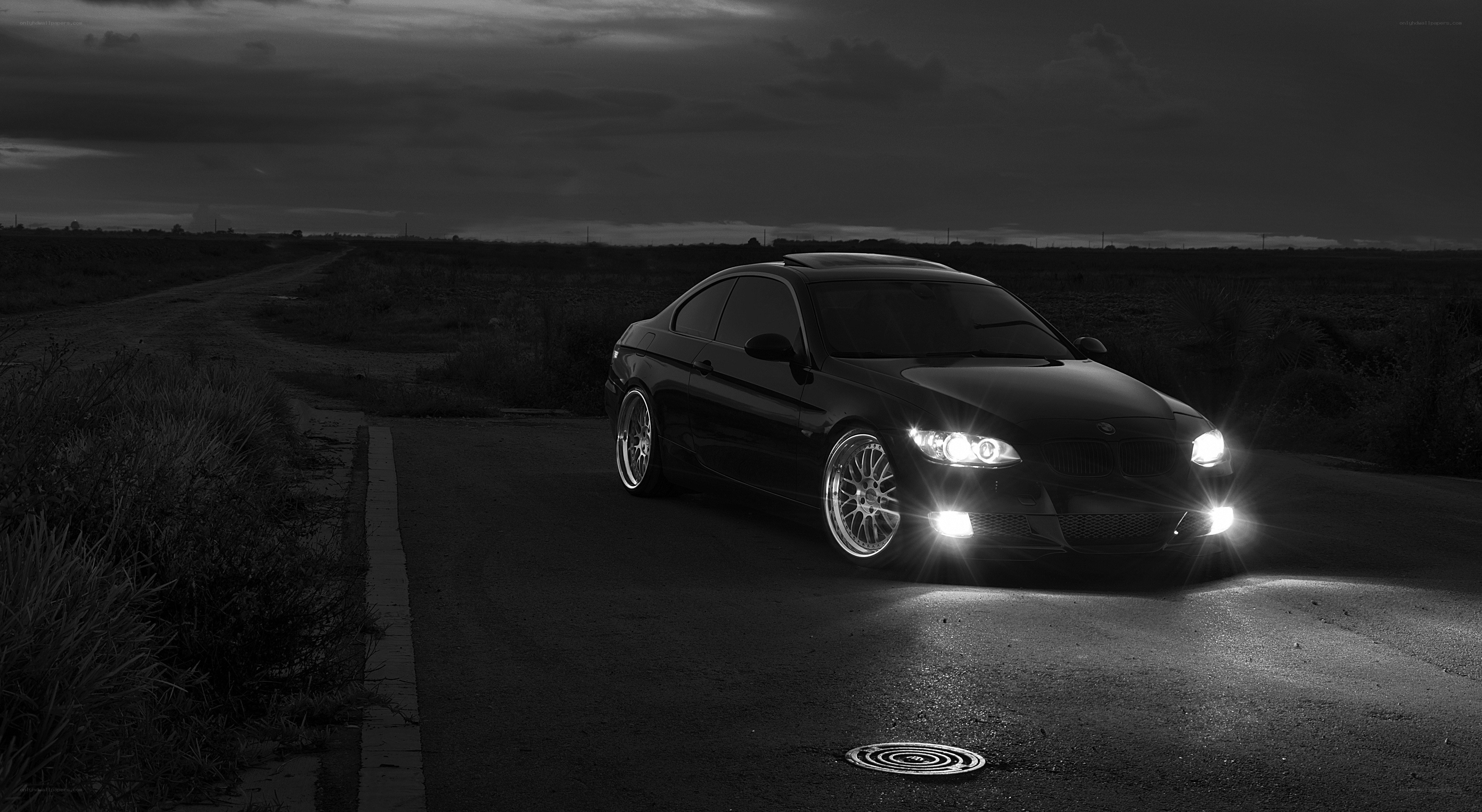 Black car on dark road