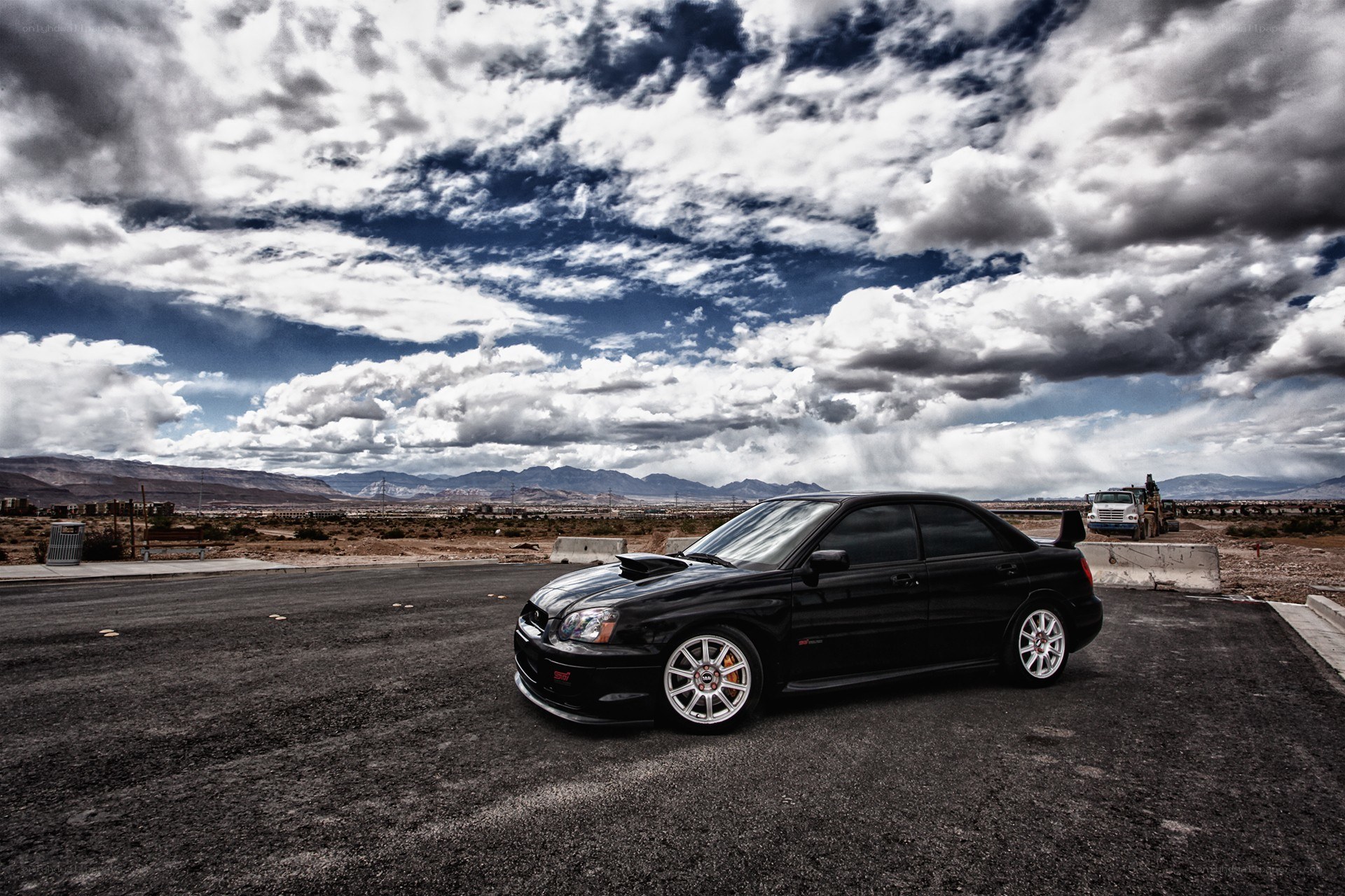 Black car on desert road