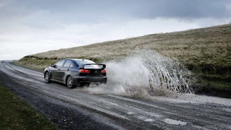 Black Car on Dirt Road — Gray