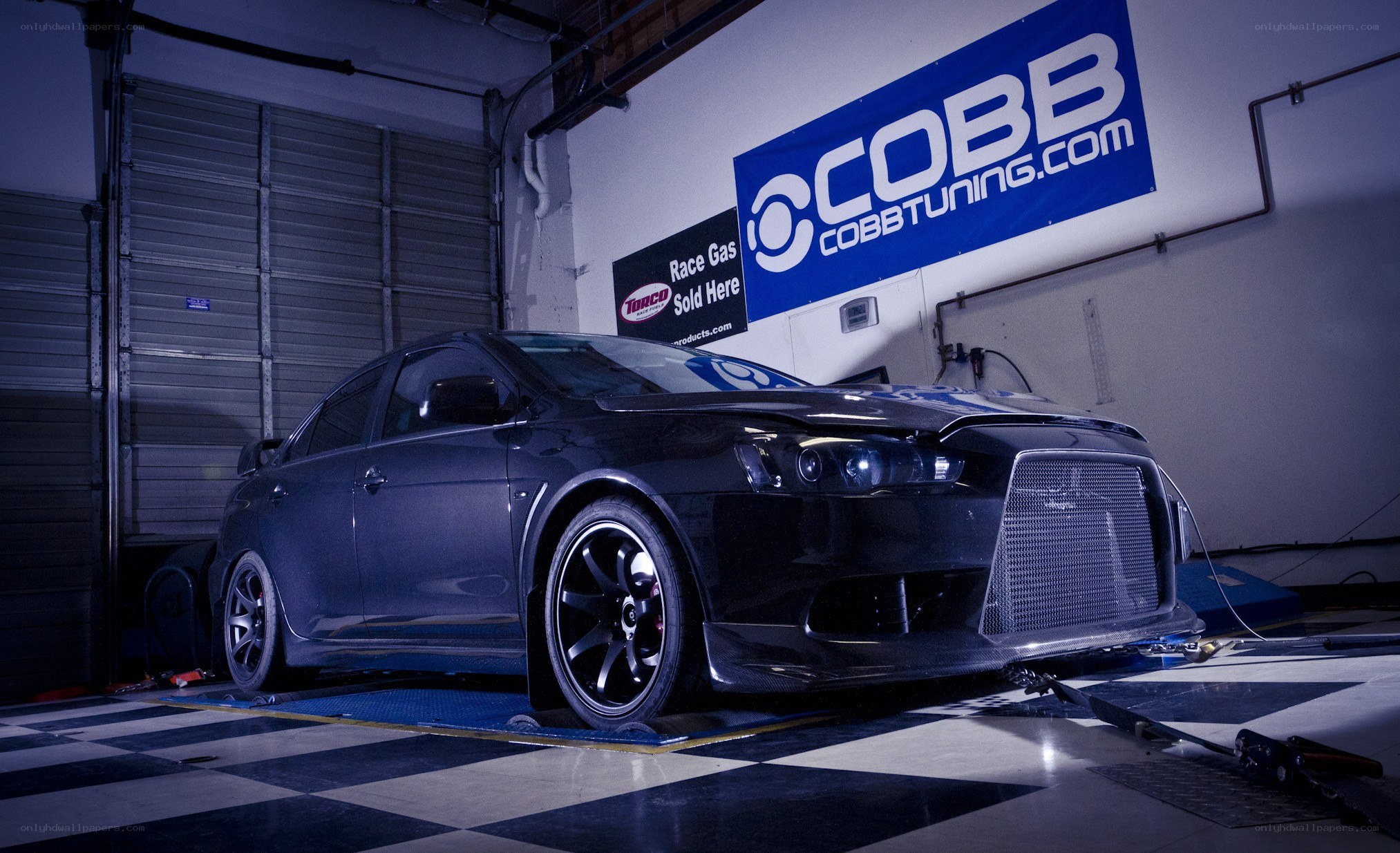 Black car on dynamometer