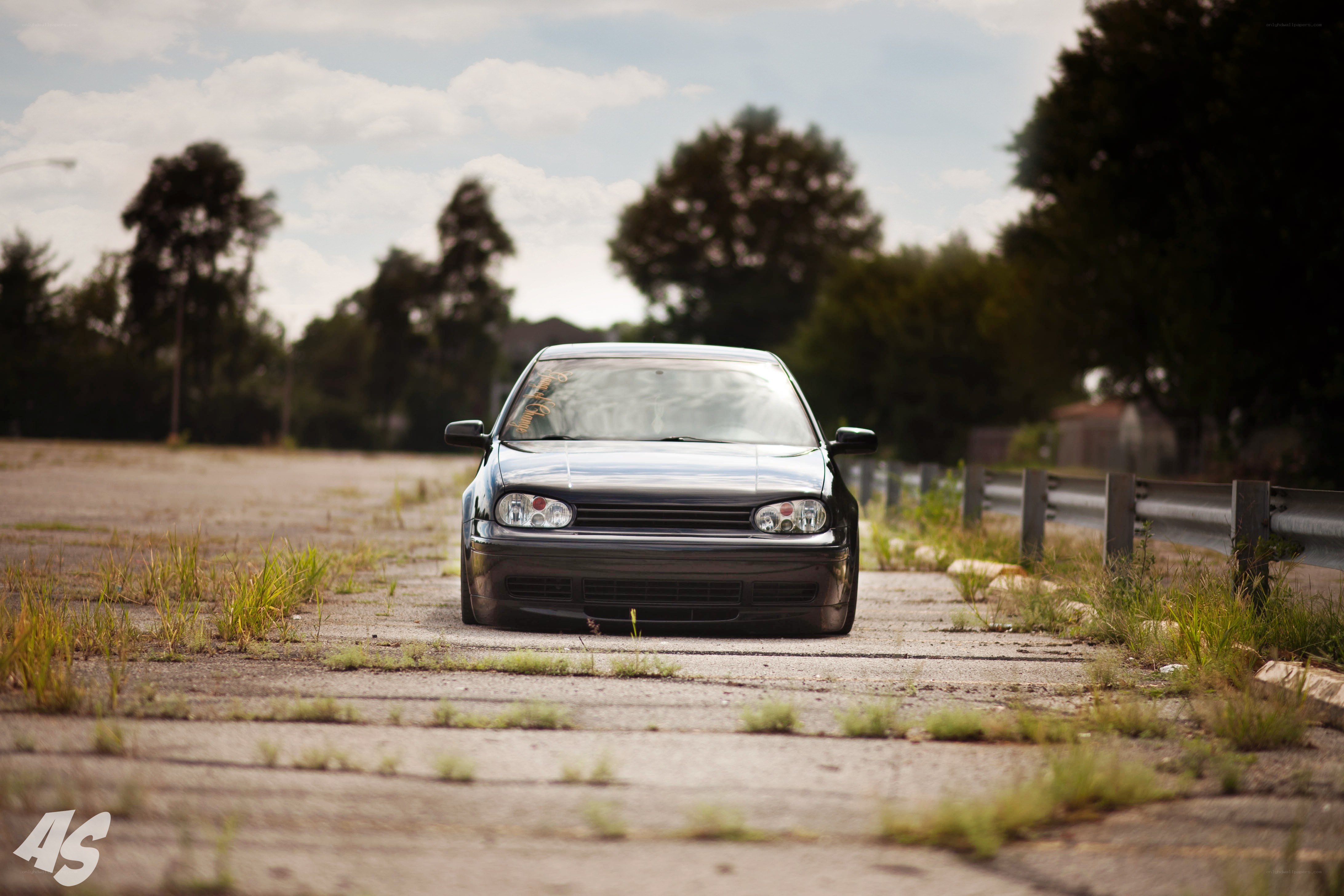 black car on empty lot