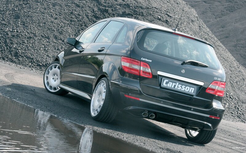 black car on gravel road