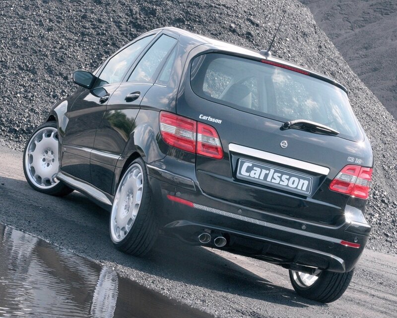 black car on gravel road