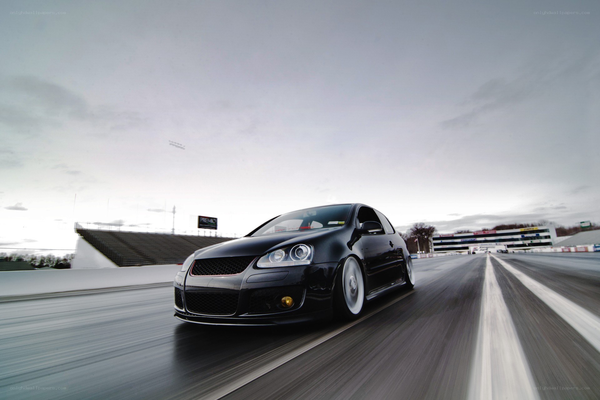 black car on racetrack