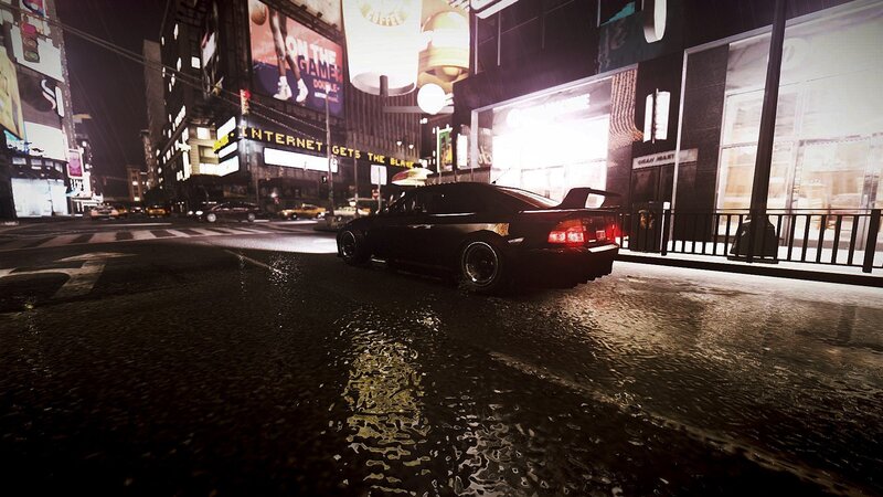 Black car on rainy city street