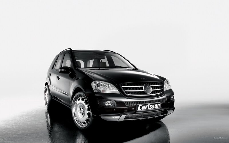 Black Car on Reflective Surface — Dramatic