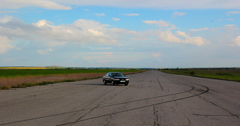 Black Car on Road — Blue