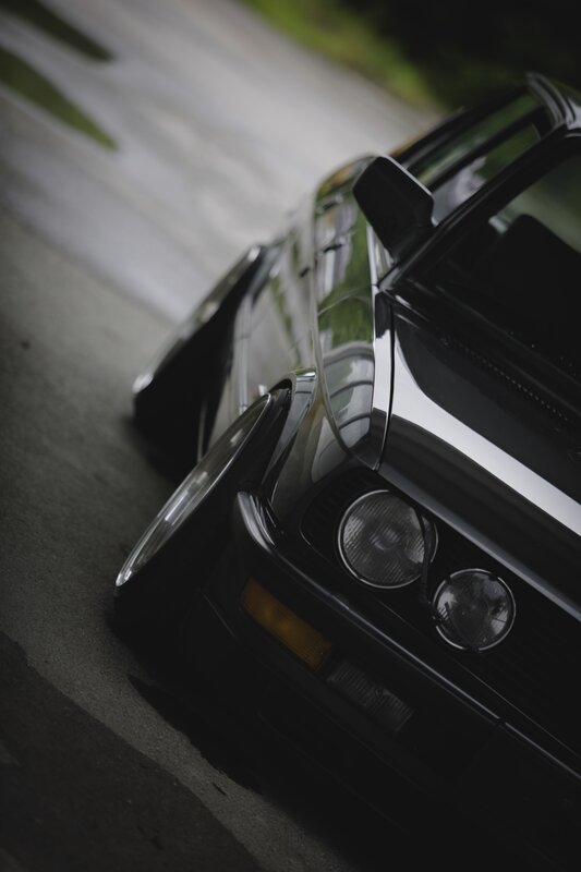 Black Car on Road — Dramatic, Photograph
