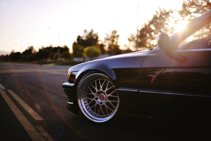 Black Car on Road — Dramatic, Sunset