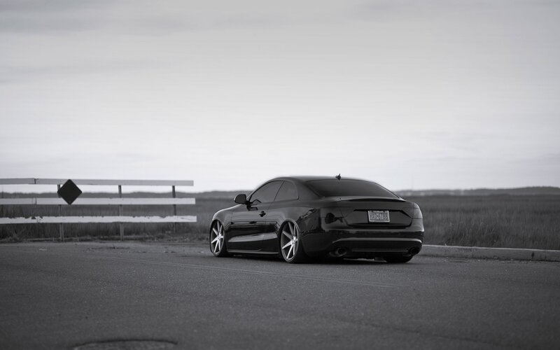 black car on rural road