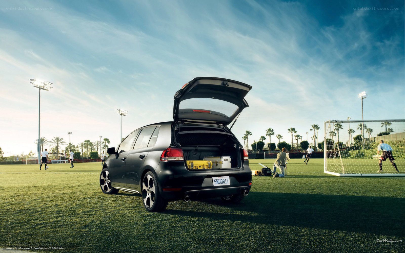 Black car on soccer field