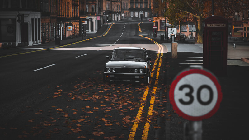 Black Car on Street — Calm