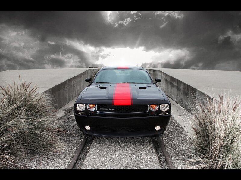 Black car on train tracks