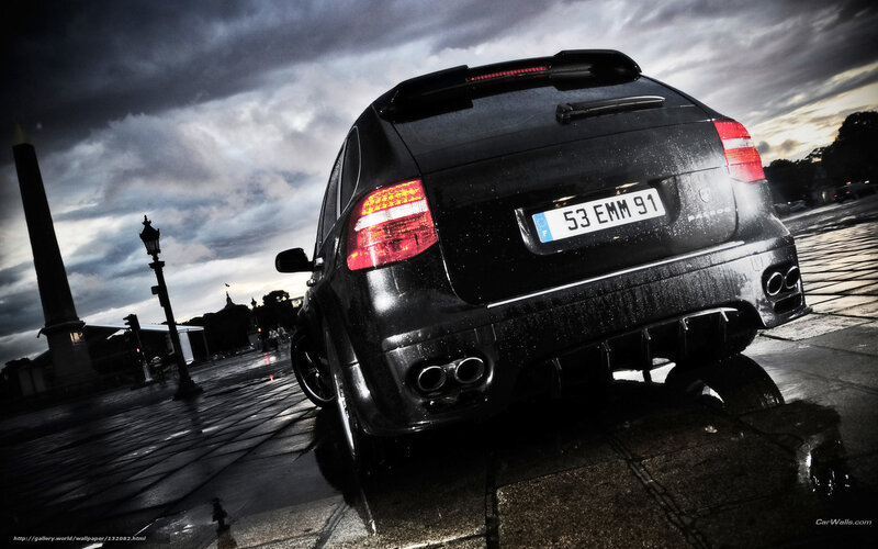 black car on wet pavement