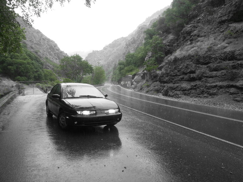Black Car on Wet Road — Dreary