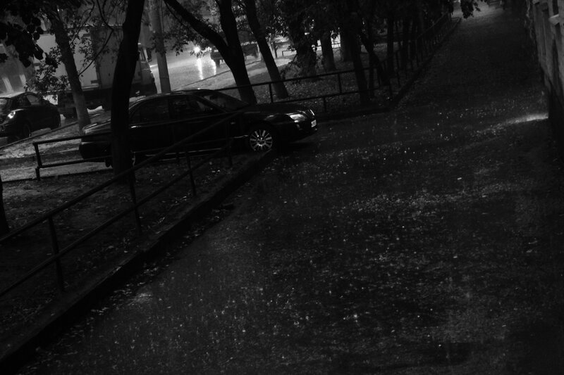 Black Car on Wet Street — Dark