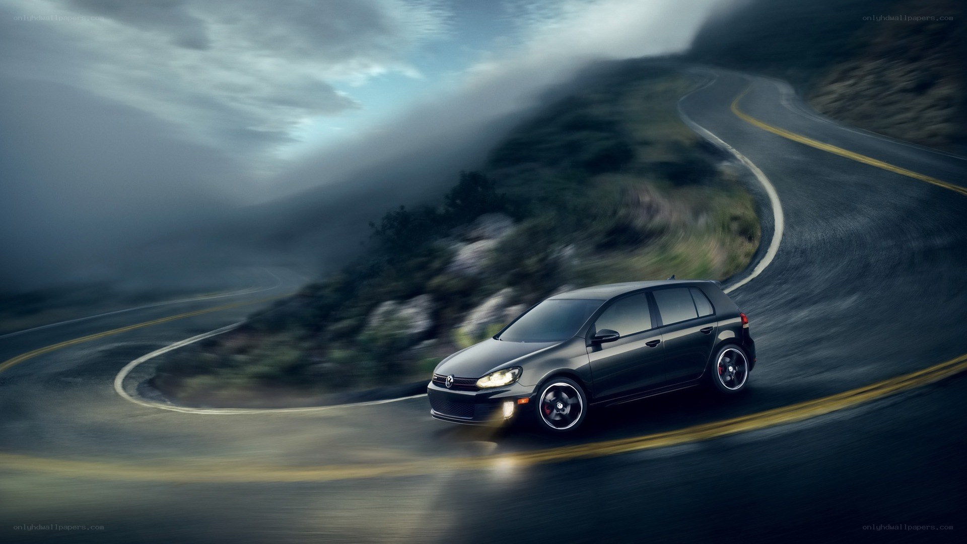 Black car on winding road