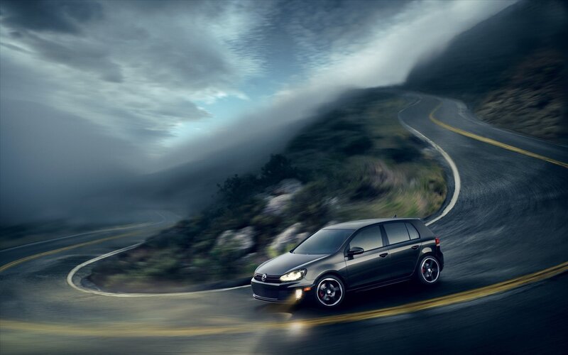Black car on winding road