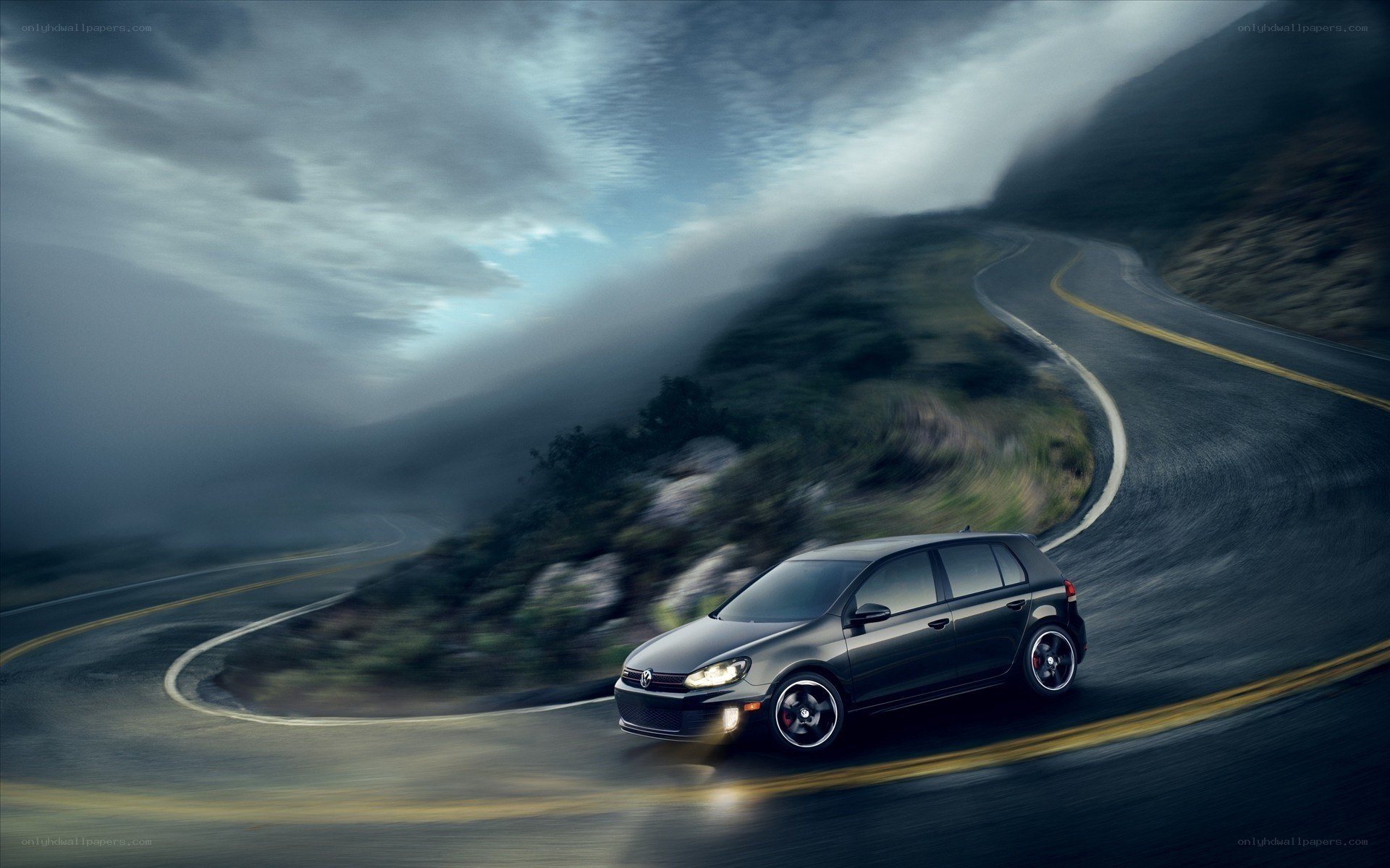 Black car on winding road