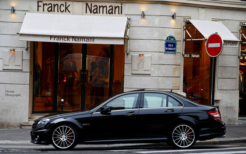 Black car outside Franck Namanis