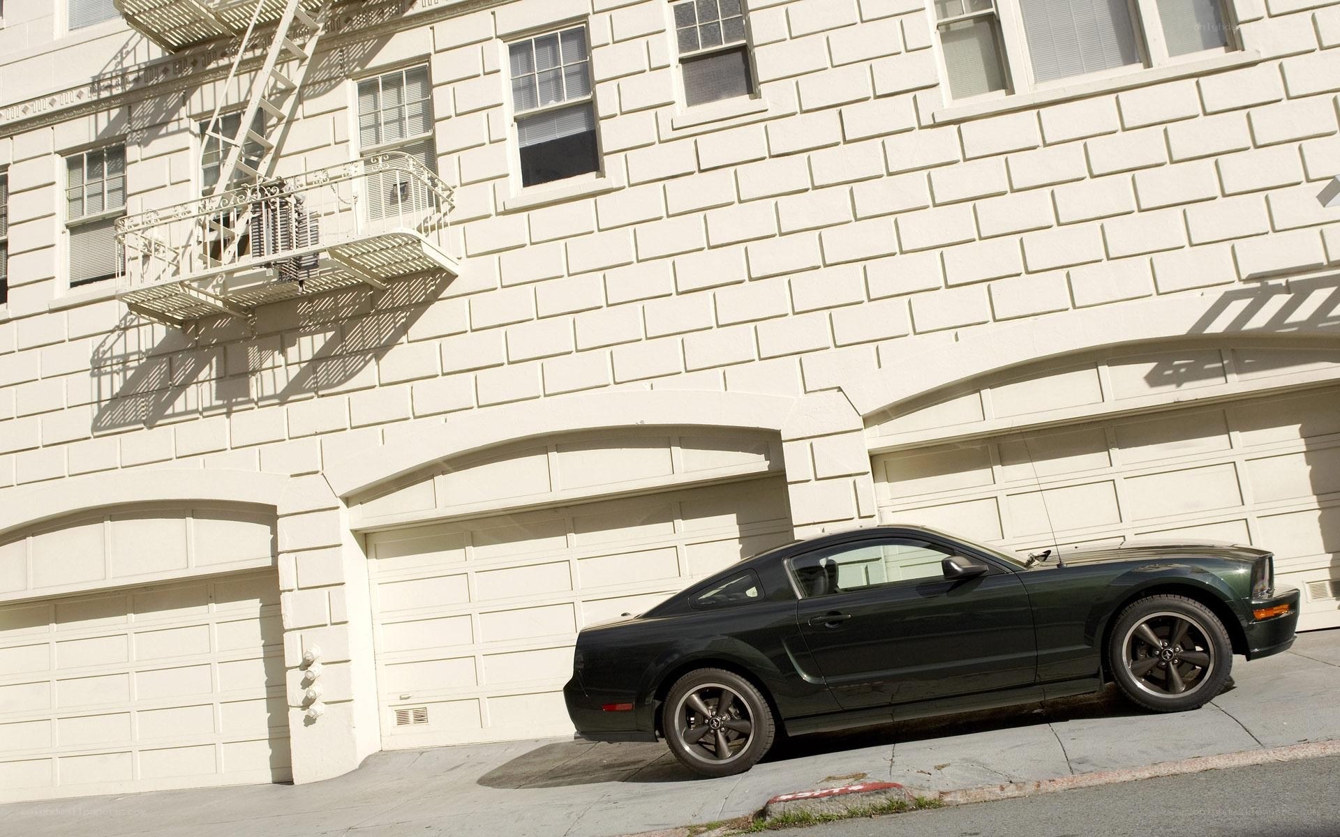 Black car parked on a hill