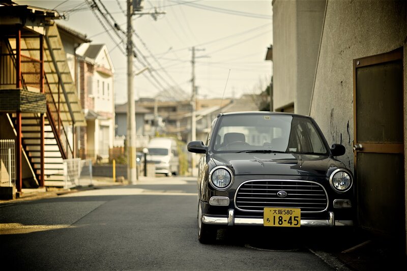 Black Car Parked on Street — Calm