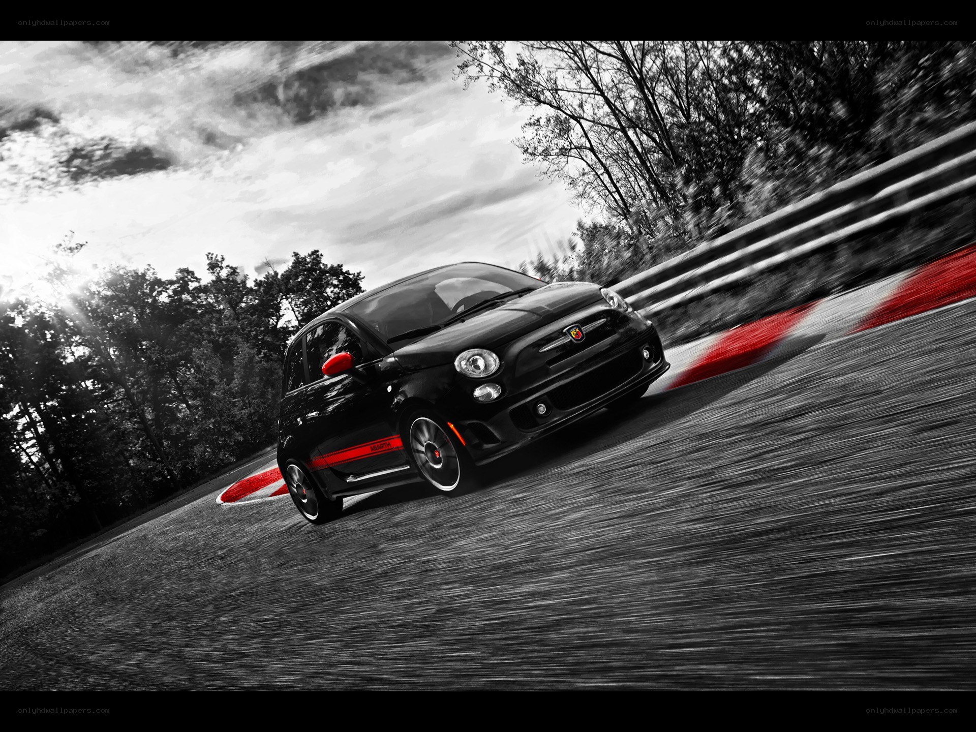 Black car racing on track